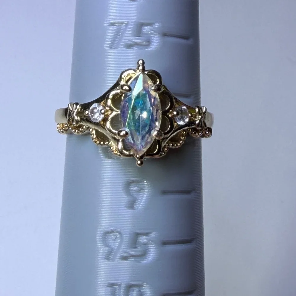 Fragrant Jewels Gold Tone Marquise Iridescent Stone Filigree Bow Ring Size 8.25